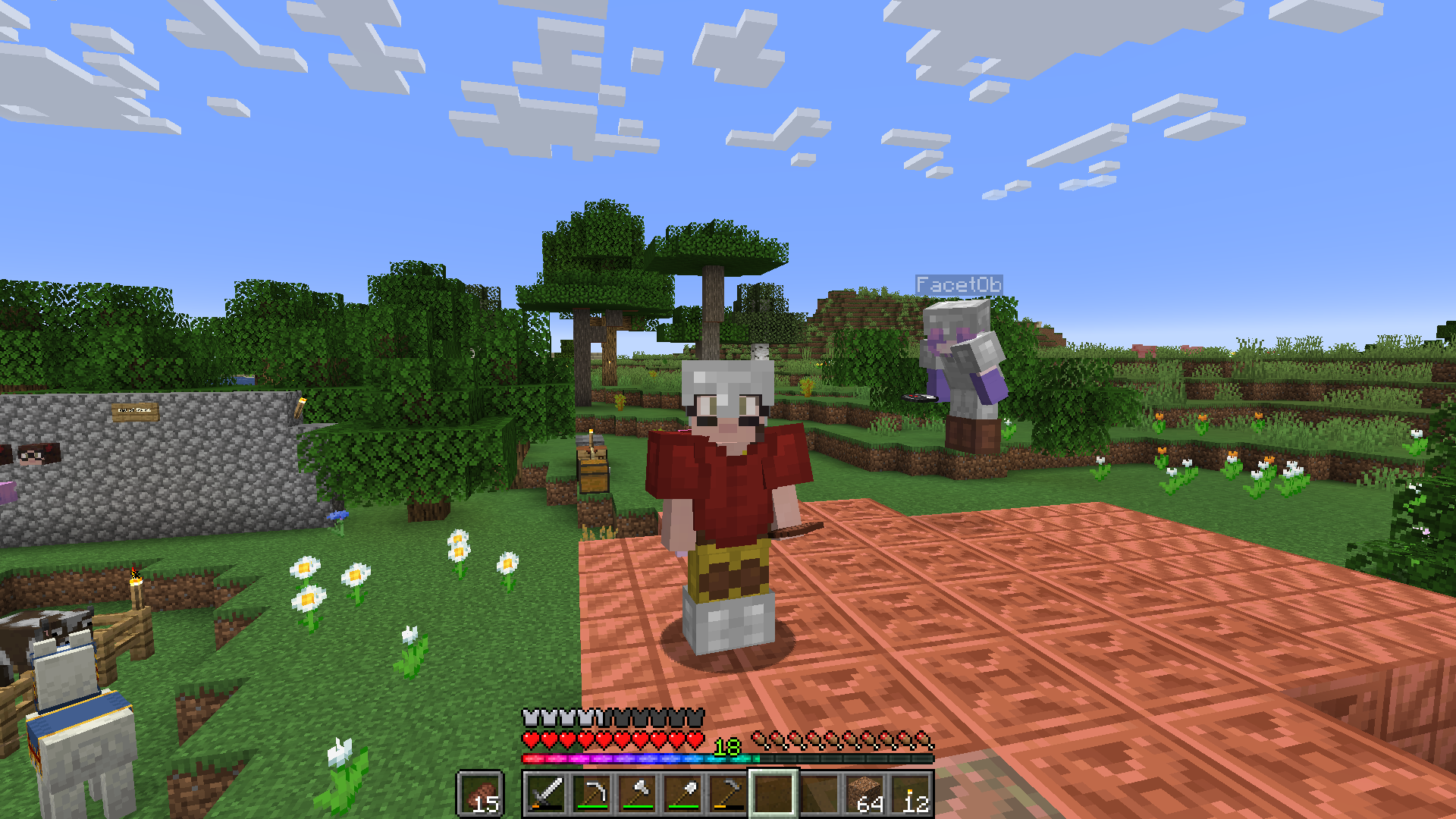 Alice und ich stehen auf dem Dach unserer Kupferhütte. Alice springt in die Luft. Einer der Kupferblöcke hat begonnen zu oxidieren. Im Hintergrund stehen einige Akazien.